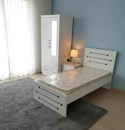 Brand new Single size bed with Mattress And two door Cabinet Available
