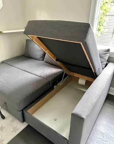 Grey L-shaped Sofa Bed with Storage - Good Condition