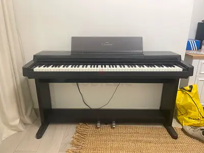Yamaha clavinova digital piano with stand and pedals - good condition
