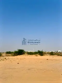A corner lot bordering three streets, in a commercial and residential area, at a great price
