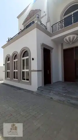 An opportunity to own a luxury villa in Tilal Complex in Sharjah, with elegant design, spacious areas, and a covered parking space inside the villa