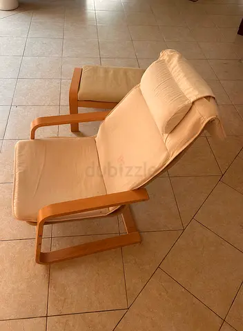 Chair, comfy and bouncy, with footstool.