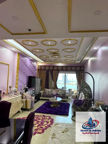 2BR for Sale in Asas Al Khan Tower, 2 Sea View Balconies, 4 Baths, Large Kitchen, Central AC & Gas, Gym, Pool & Parking