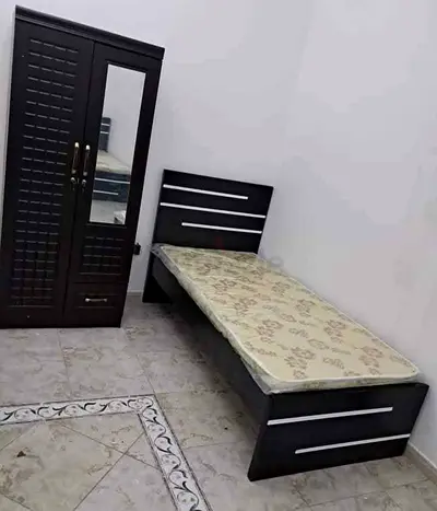 Brand new Single size bed with Mattress And two door Cabinet Available