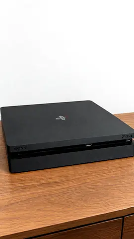 PlayStation 4 Slim - Good working condition, includes power and HDMI cables