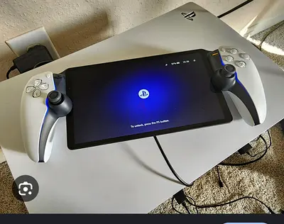PlayStation Portal remote player with two DualSense Edge controllers