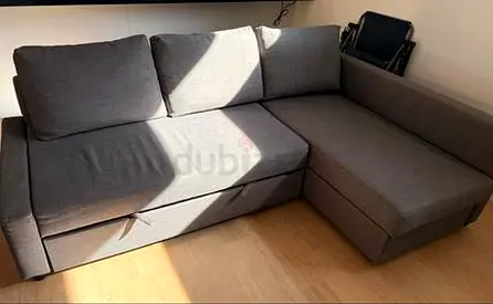 Grey L-shaped Sofa Bed with Storage - Good Condition