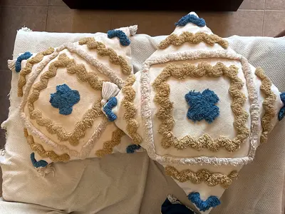 Set of 2 textured decorative throw cushions - cream with blue & beige accents