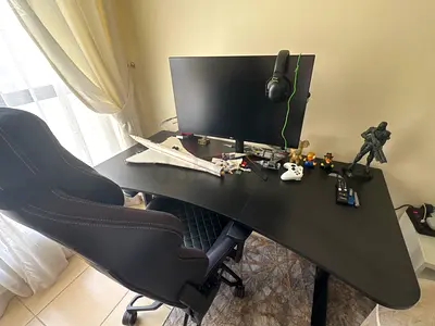 Large Black Corner Computer Desk - L-Shaped, Good Condition with gaming chair and monitor included.