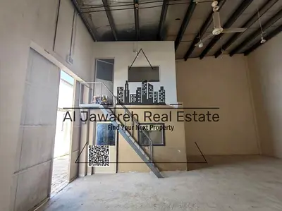 A prime warehouse is available for rent in Ajman Industrial Area, strategically located on a main road, providing easy access and convenient vehicle