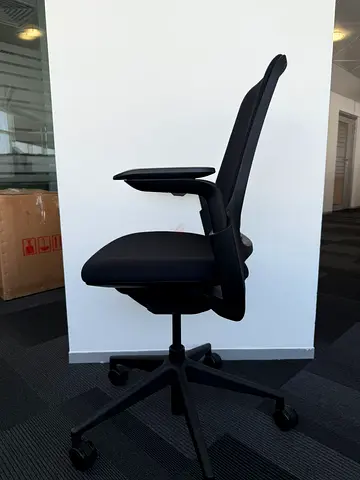 Steel Case Brand Ergonomic Black Office Chair with Adjustable Arms and Wheels