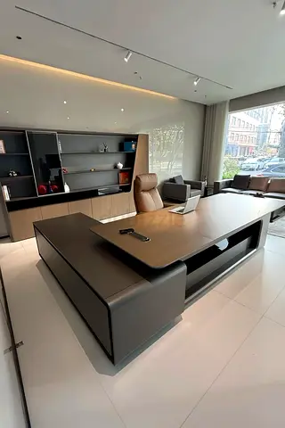 Modern executive office desk with matching storage and leather chair