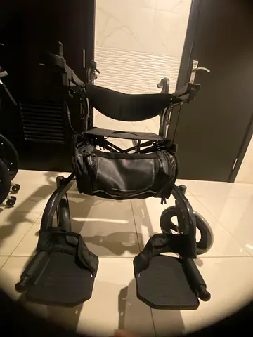 Electric wheel chair with trolley, brand new