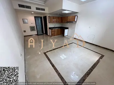 Annual Rent in Ajman, Al Rawda 2: Spacious studio with central AC, near all services and Sheikh Ammar St, easy payment options.