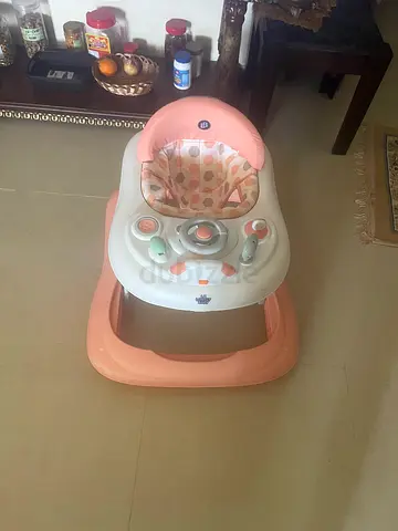 Lightweight baby walker with activity tray - good condition