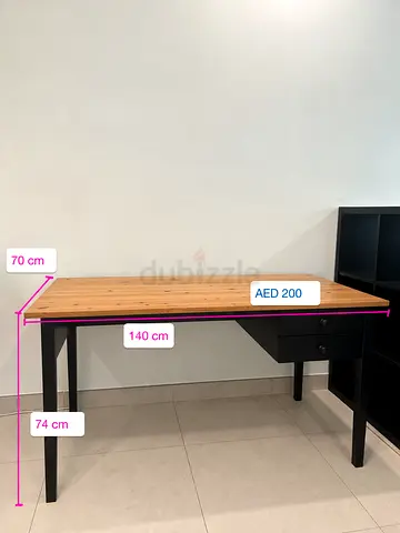 Sleek wooden desk and drawers for home office