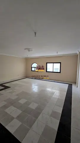 For annual rent in Al Qasimia Al Mahatta, Sharjah. Spacious 3-bedroom apartment with master bedroom, 3 bathrooms, open view and large living spaces. A