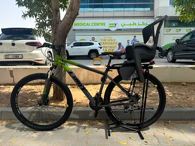 Brand New Aluminium Large MTB with New Baby seat Polisport. Bike has 7*3 speed Size 29 & Suspension