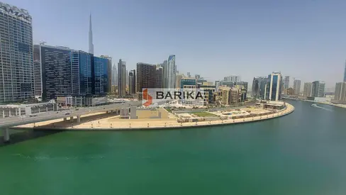 Elegant 1BR | Corner panoramic unit | Canal View |