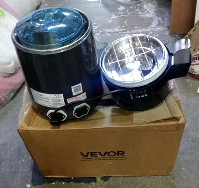 750W countertop VEVOR Water Distiller or similar generic 4L distilled water machine.