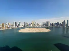 A distinctive apartment for sale in the Shorafat Sharjah Tower, featuring a unique view and a prime 