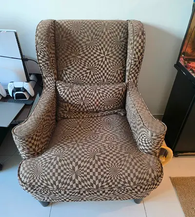 Used patterned wingback armchair — comfortable single lounge chair