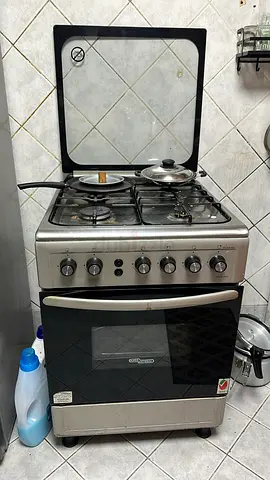 Used 4-Burner Gas Stove with Oven - Good Working Condition