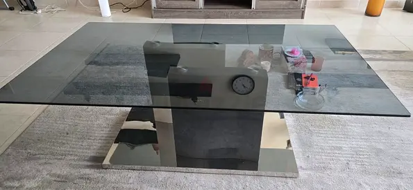 Modern rectangular glass coffee table with mirrored base