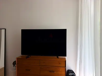 The Sony Bravia KD-65A8H is a 65-inch 4K Ultra HD Smart OLED