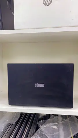 Stone branded laptop - used, functioning, simple black chassis