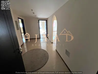 1BR in Al Rawda 2, Ajman, annual rent. Near schools & Dubai exit, 2 baths, balcony, central AC, eas