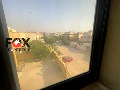 One-bedroom apartment with a living room for annual rent in Al Muwaihat 3, Ajman; new building, firs