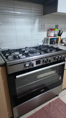 5-Burner Stainless Steel Gas Stove with Built-in Oven - Good Condition
