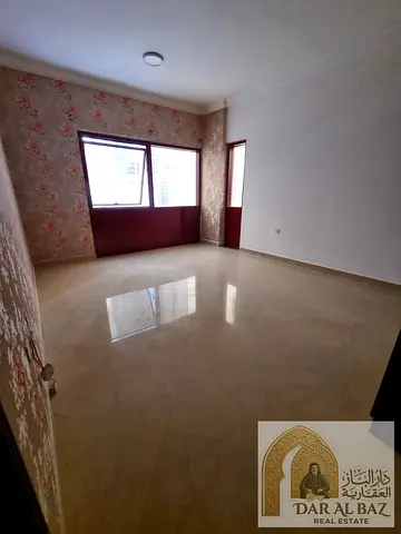 A two-bedroom apartment with a living room is available for annual rent in the Al Khan area of Sharjah. It features a distinctive view of Al Khan La