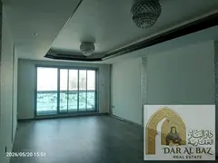 Two-bedroom apartment with a living room available for annual rent in Corniche Tower. It features a 