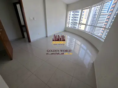 For Rent in Al Khan, Sharjah, a beautiful and spacious three-bedroom apartment with a living room, ideal for families looking for comfort and a prime