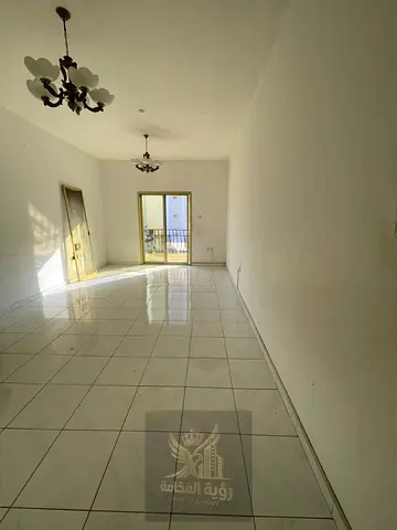 Spacious 2BR Apartment for Annual Rent in Abu Shagara Opposite a Mosque with Balcony & Built-in Wardrobes