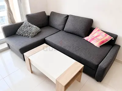 Grey L-shaped Fabric Sofa bed Good Condition