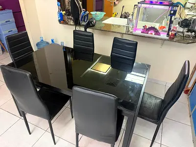 6-Seater Black Glass Dining Table with Faux Leather Chairs
