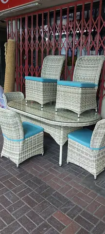 Wicker rattan dining set with glass top — 4 chairs (good condition)