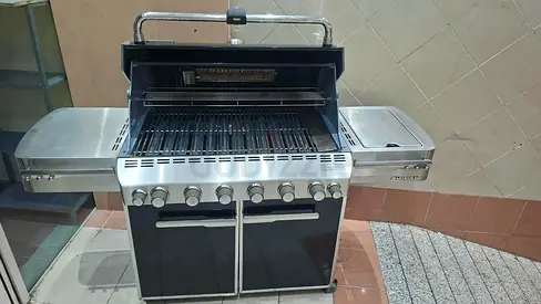 Weber Summit E-670 6-burner gas grill with a side burner