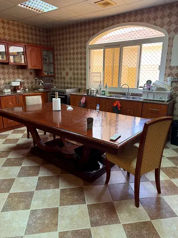 Solid Wood Dining Table with 6 Upholstered Chairs - Good Condition