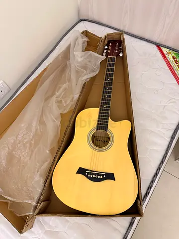 Light Natural Cutaway Acoustic Guitar - Good Condition