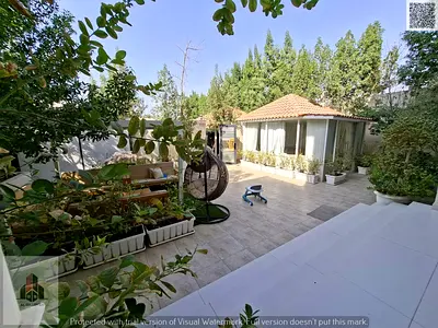 A luxury villa in Al Muwaihat 2, featuring five rooms. The price includes furniture, utilities (electricity and water), and air conditioning. The prop