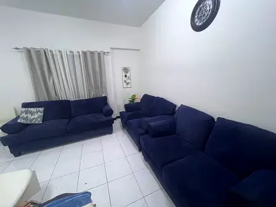 Comfortable 7-seater Navy Blue Fabric Sofa - Good Condition