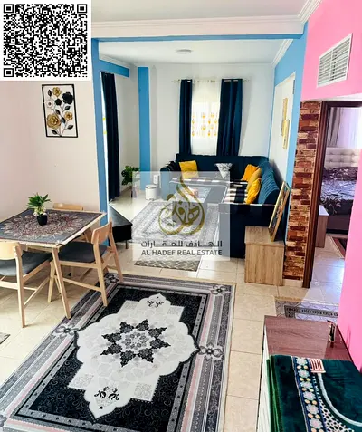 Fully furnished one-bedroom apartment with a living room, located directly on the Ajman Corniche (Al Nakhil 2) overlooking the sea—situated in the Al