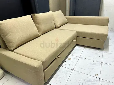 Beige L-shaped Sofa bed with Storage - Good Condition