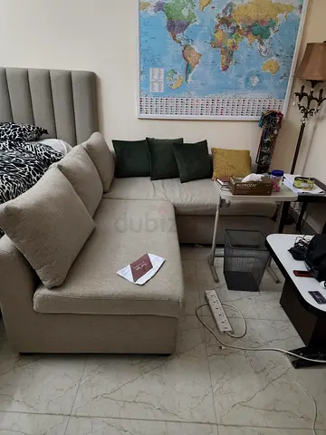 Beige L-shaped Corner Sofa with Cushions - Good Condition