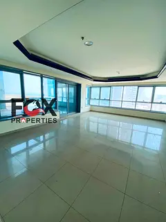 2 Bedroom Apartment with Living Room for Sale in Corniche Tower Ajman 2182 Sq Ft City View Partial S