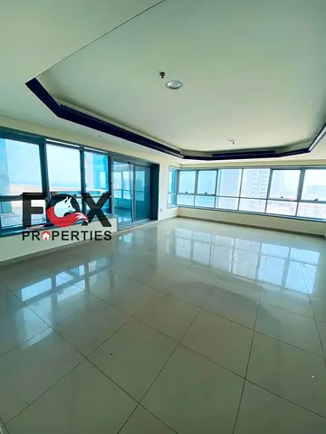 2 Bedroom Apartment with Living Room for Sale in Corniche Tower Ajman 2182 Sq Ft City View Partial